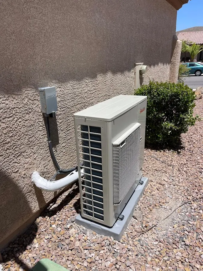 Residential air conditioning condenser unit in Attalla